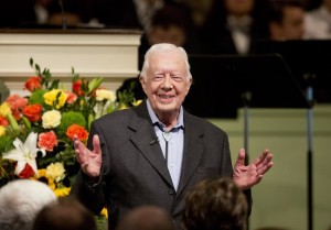 Former President Jimmy Carter teaches Sunday School class at Maranatha Baptist Church in his hometown Sunday, Aug. 23, 2015, in Plains, Ga. The 90-year-old Carter gave one lesson to about 300 people filling the small Baptist church that he and his wife, Rosalynn, attend. It was Carter's first lesson since detailing the intravenous drug doses and radiation treatment planned to treat melanoma found in his brain after surgery to remove a tumor from his liver. (AP Photo/David Goldman)