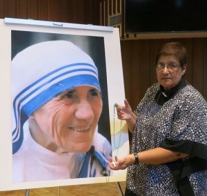 Susan McCaffrey with the rosary from Mother Theresa