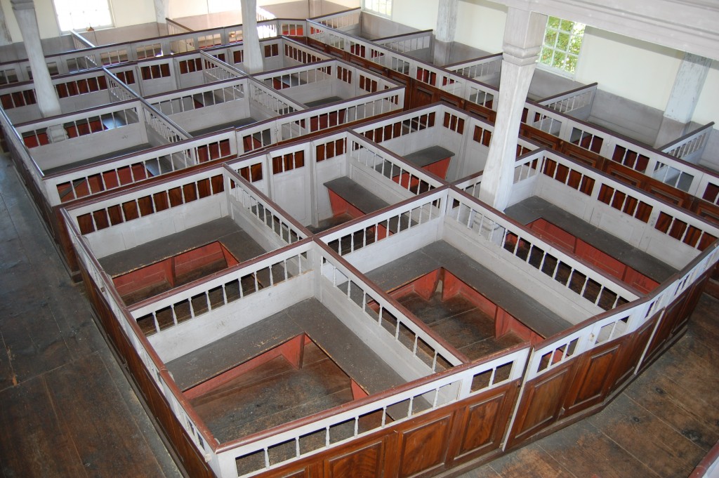 In Colonial America, boxes around pews ensured that no one would ever sit in your spot in church. (Wikimedia Commons image)